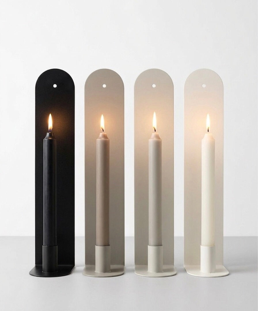 The Skinny powder-coated steel wall sconce colour range by Nomad Studio.