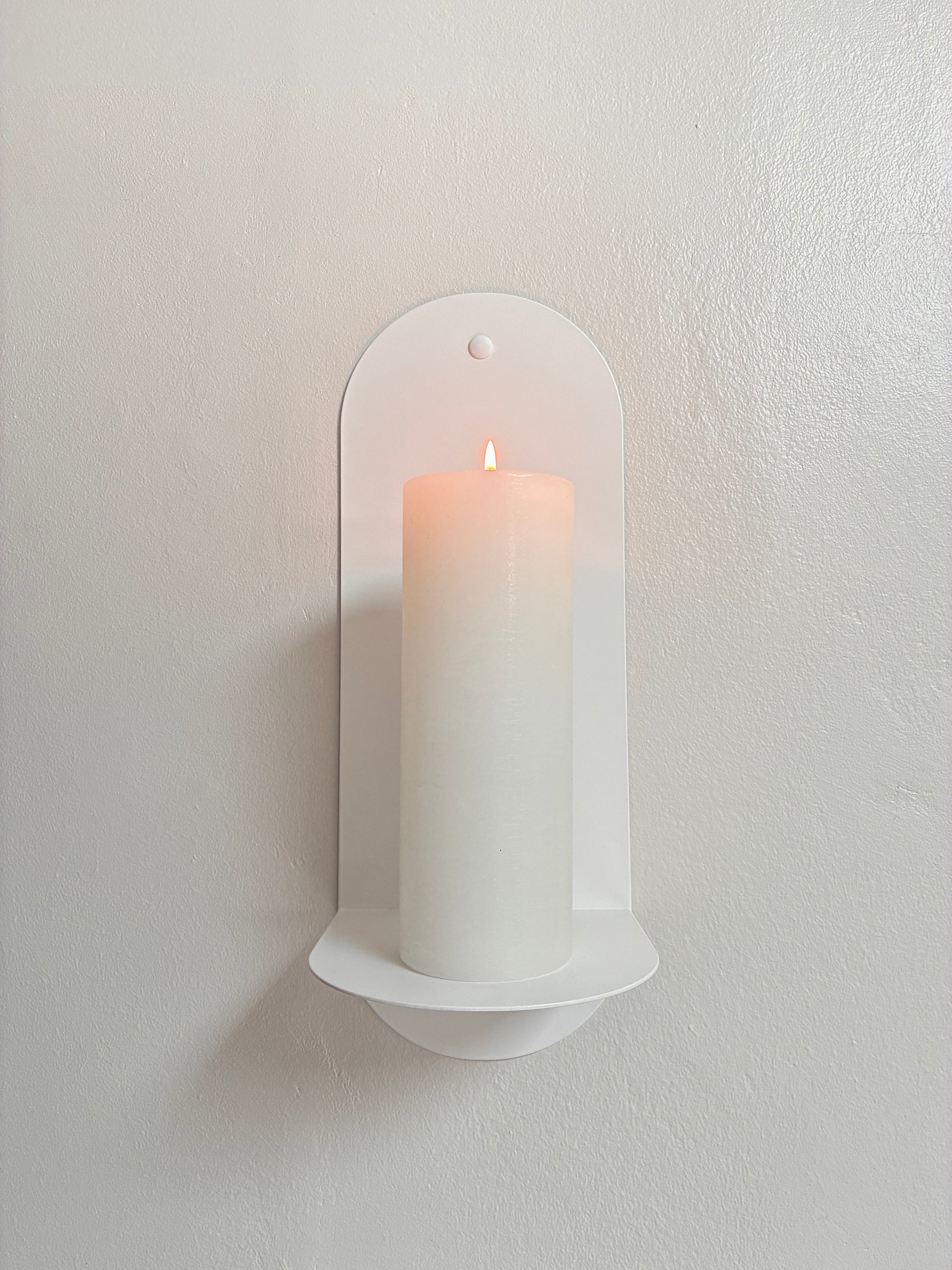 The Oracle wall sconce in Bone White on a white background, Nomad Studio